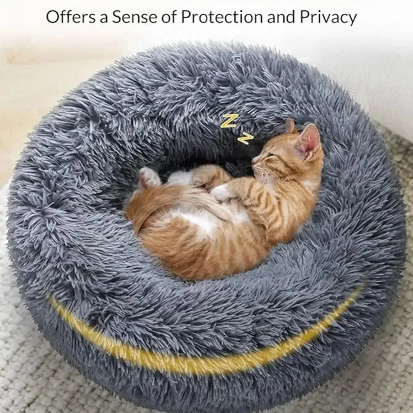Fluffy calming pet bed with a sleeping cat, offering comfort and security for pets.