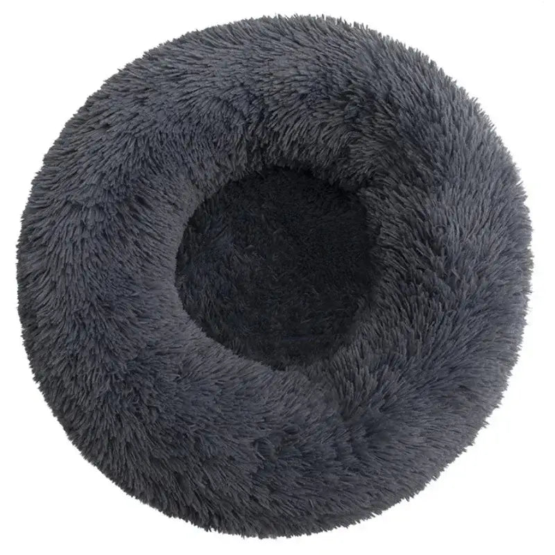 Fluffy Calming Pet Bed in dark gray, featuring plush material and raised rim for pet relaxation and security.